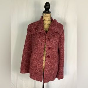 Sweater with buttons.